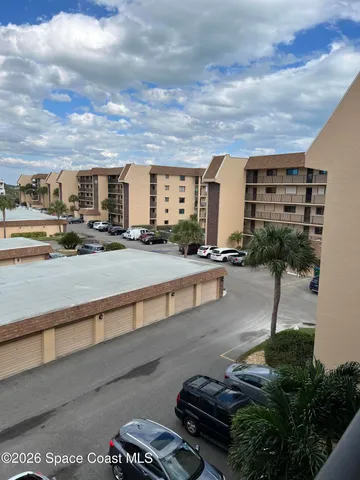 a view of a back yard of the house