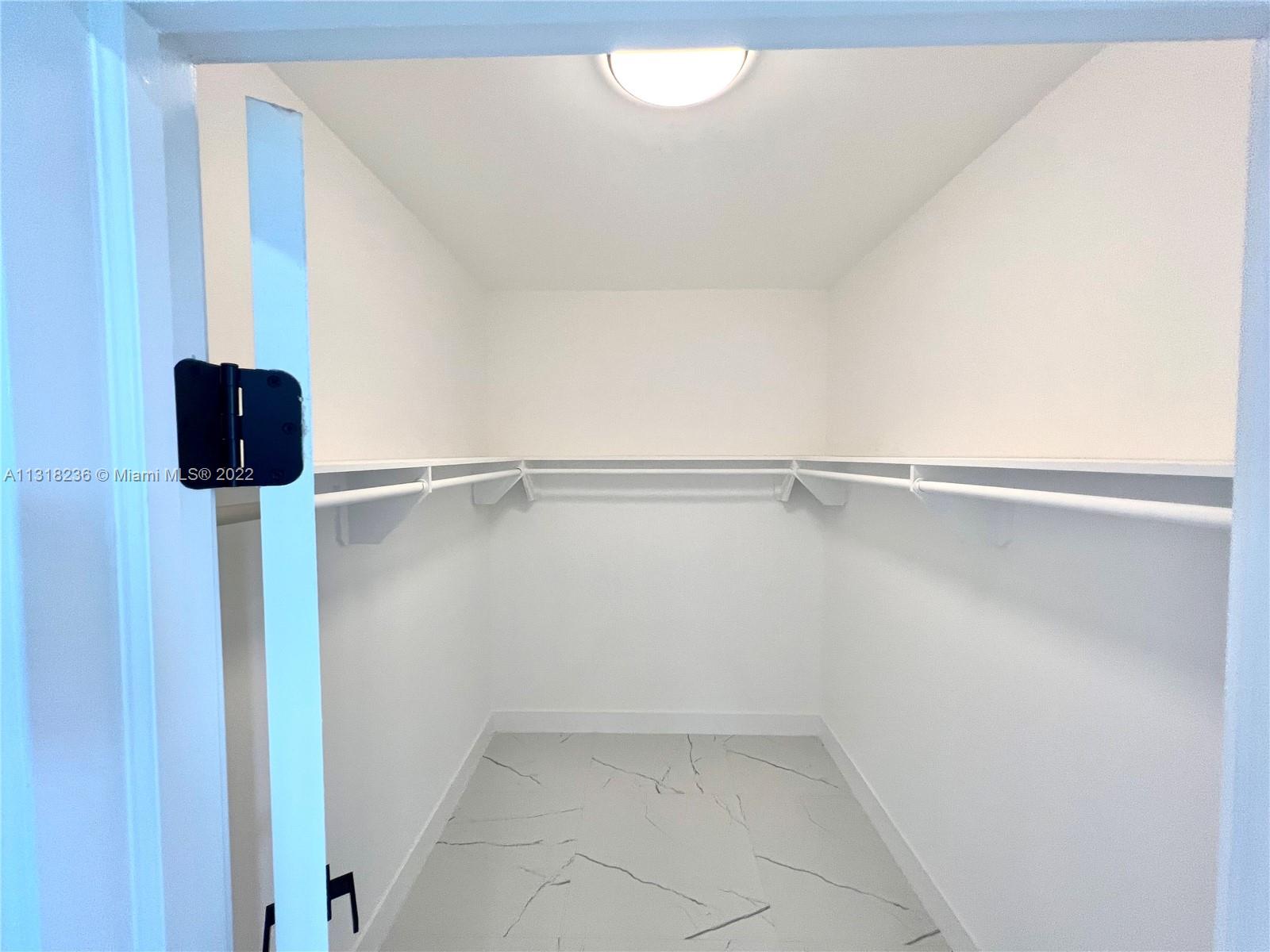 964 Rutherford Lane Haverhill, FL 33415 - Photo 12 of 18 a close view of a closet