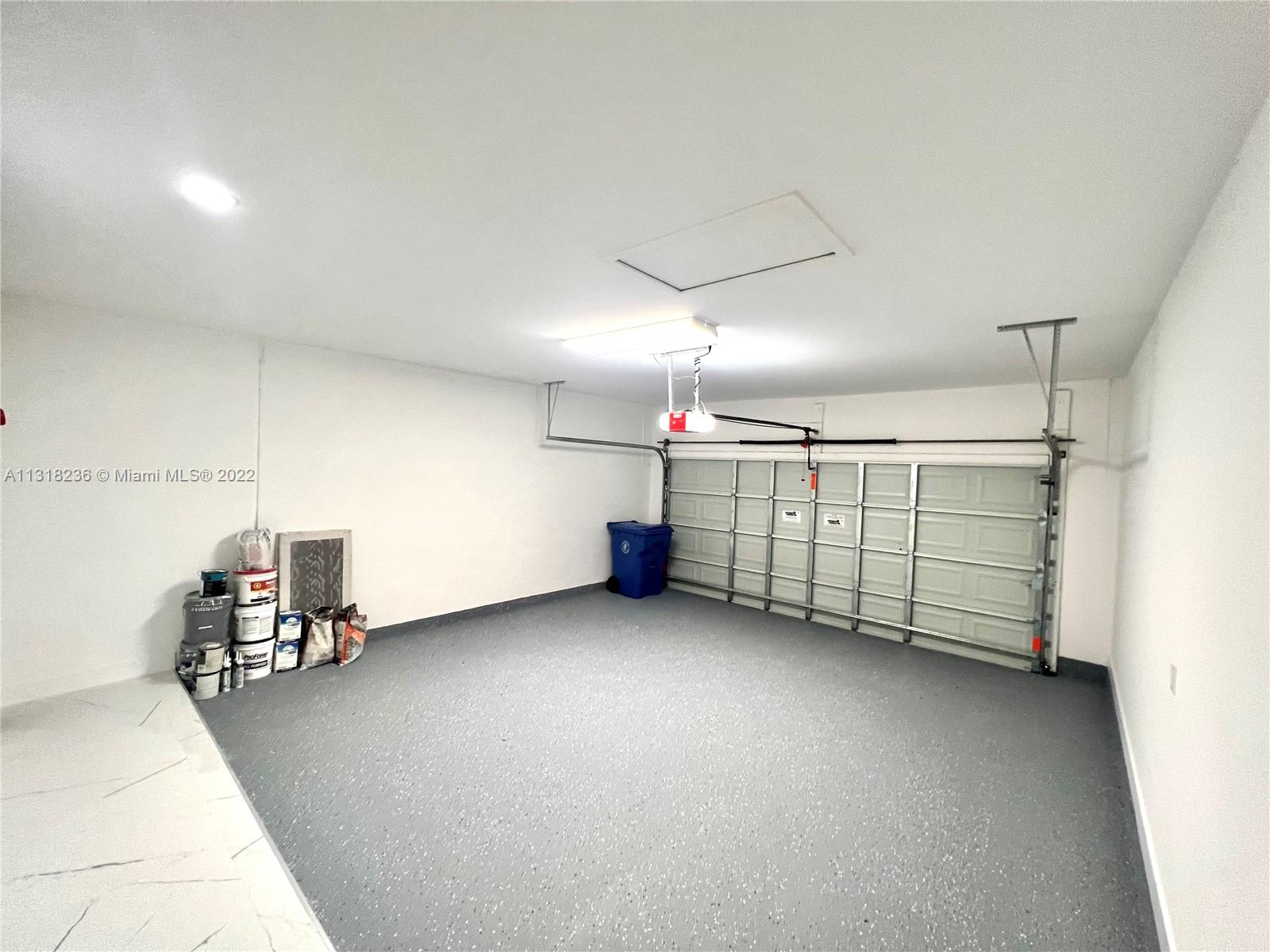 964 Rutherford Lane Haverhill, FL 33415 - Photo 17 of 18 a view of a garage