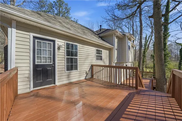 a view of a house with stairs and wooden floor