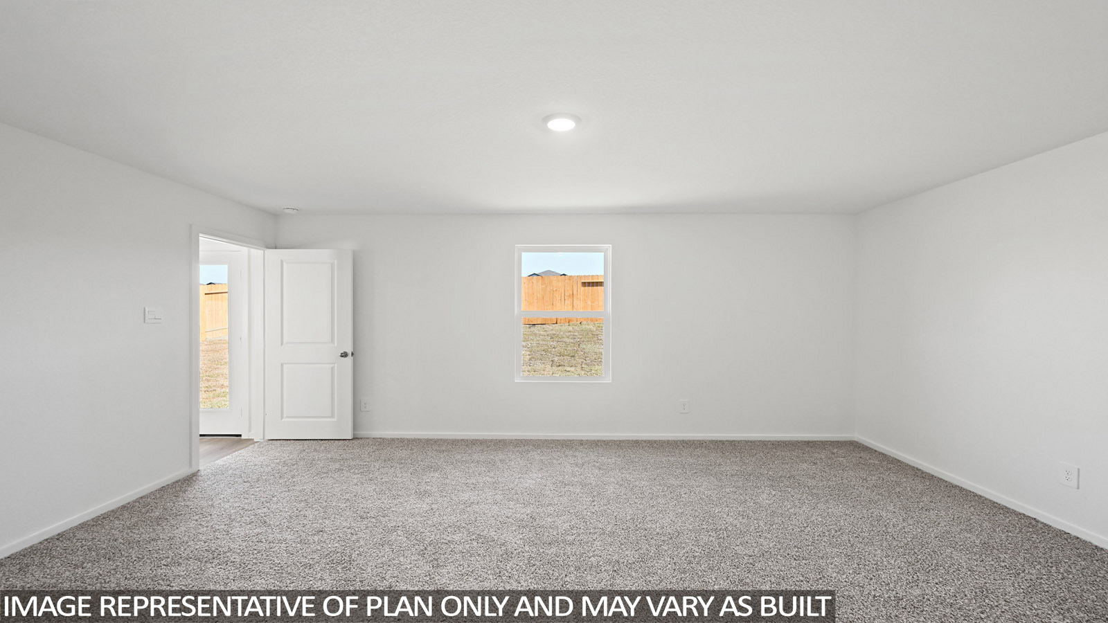 165 Baby Calf Roping Road Jarrell, TX 76537 - Photo 8 of 24 An inviting room awaits personalization, complete with soft carpeting and a window overlooking the backyard.