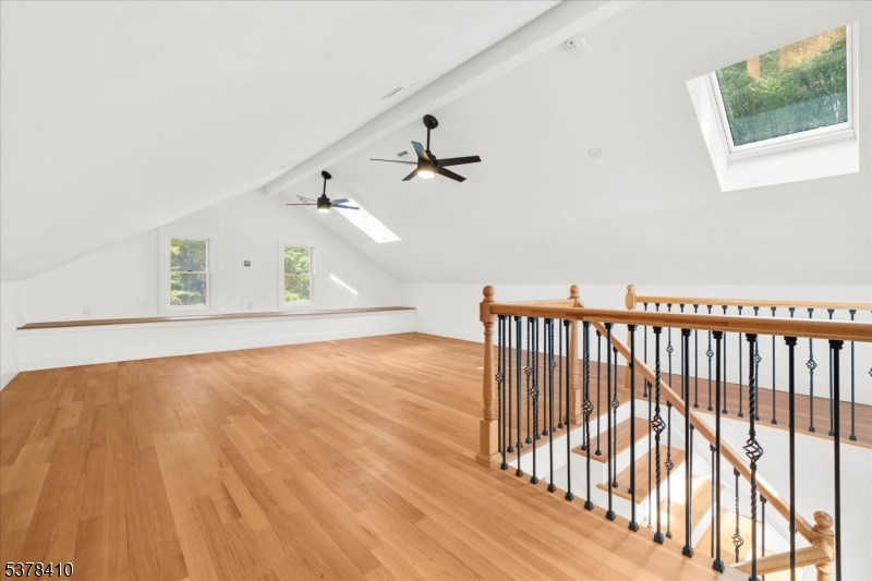 48 Norris Road Denville, NJ 07834 - Photo 20 of 33 a view of a room with wooden floor and white walls