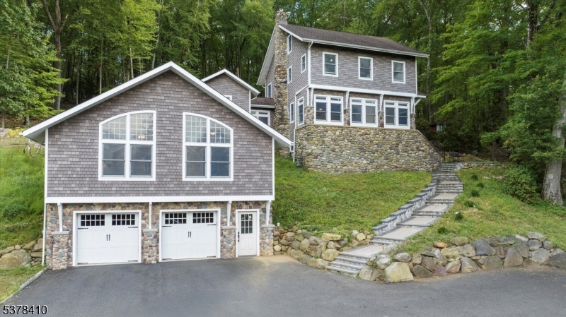 48 Norris Road Denville, NJ 07834 - Photo 2 of 33 a front view of a house with a yard