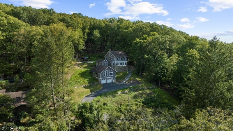 48 Norris Road Denville, NJ 07834 - Photo 30 of 33 a view of a city with lush green forest