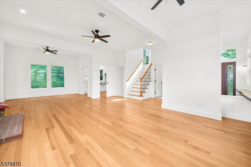 48 Norris Road Denville, NJ 07834 - Photo 8 of 33 a view of empty room with wooden floor and fan