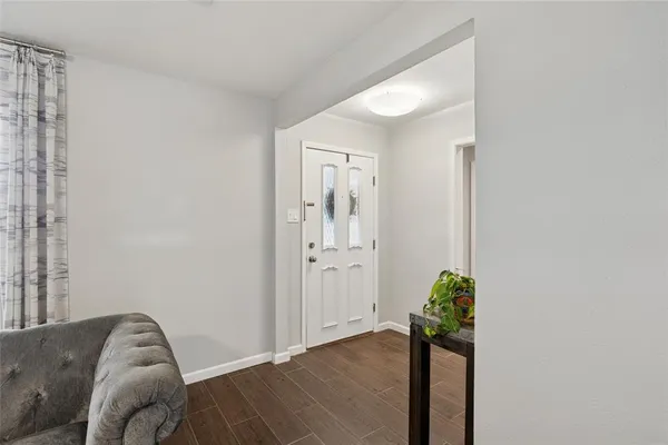 a view of livingroom with furniture and wooden floor