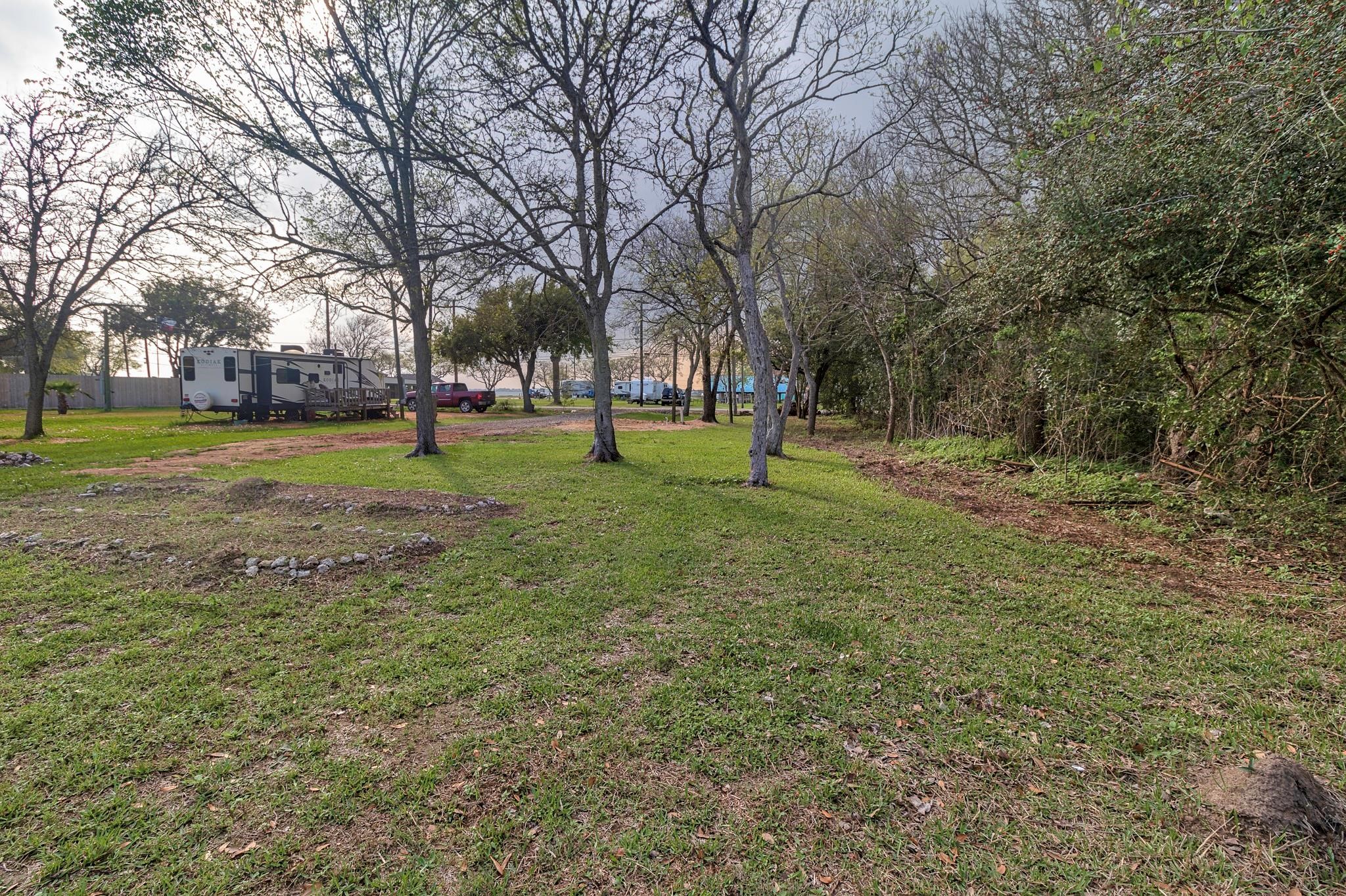 1207 11th Street Dickinson, TX 77539 - Photo 8 of 9 a huge green field with lots of trees