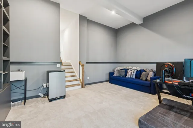 a view of a livingroom with furniture and furniture