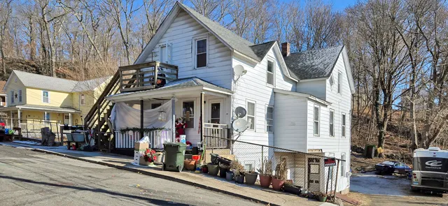 a view of a street with cars
