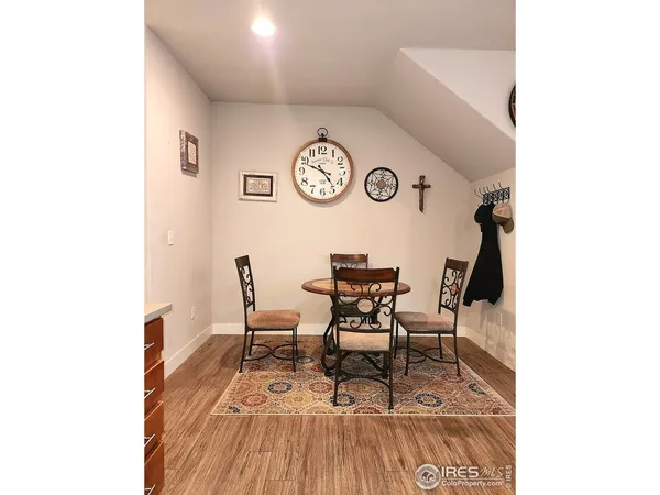 a view of a chairs and table in a room