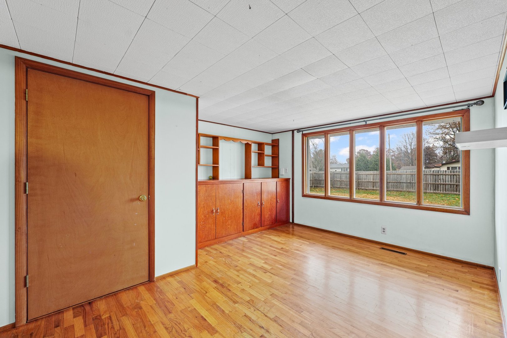 911 South Longview Road Monticello, IL 61856 - Photo 15 of 28 a view of an empty room with glass door