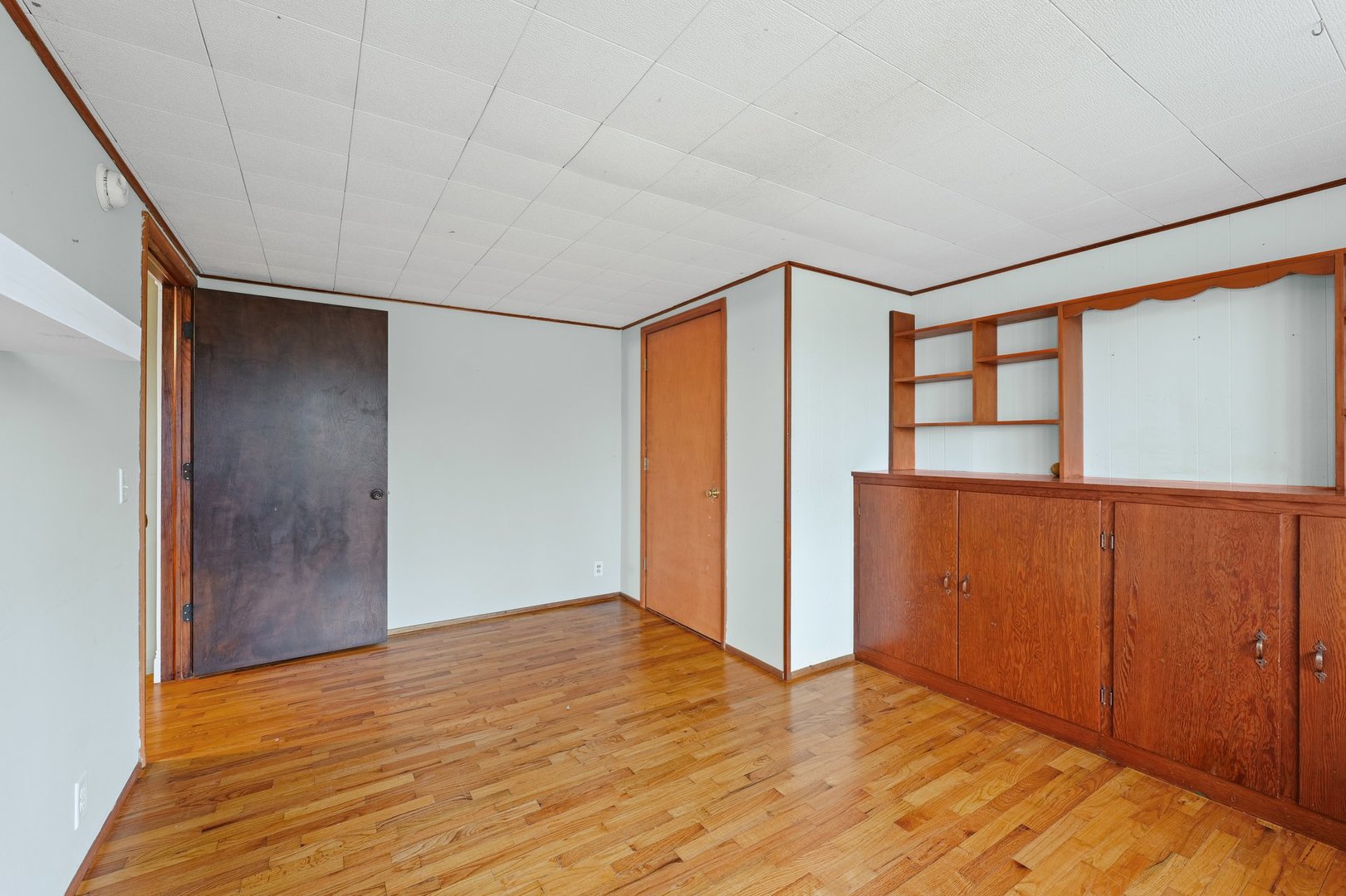 911 South Longview Road Monticello, IL 61856 - Photo 16 of 28 a view of an empty room with wooden floor and a window
