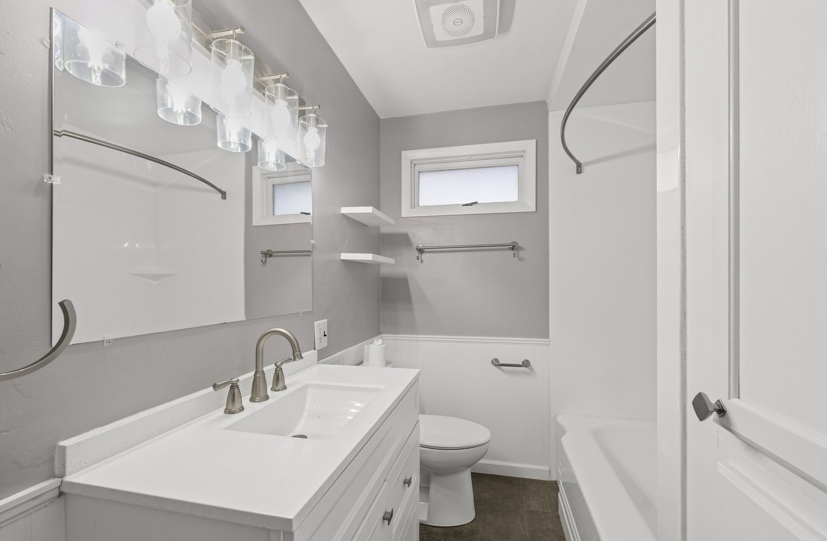 911 South Longview Road Monticello, IL 61856 - Photo 19 of 28 a bathroom with a sink toilet and shower