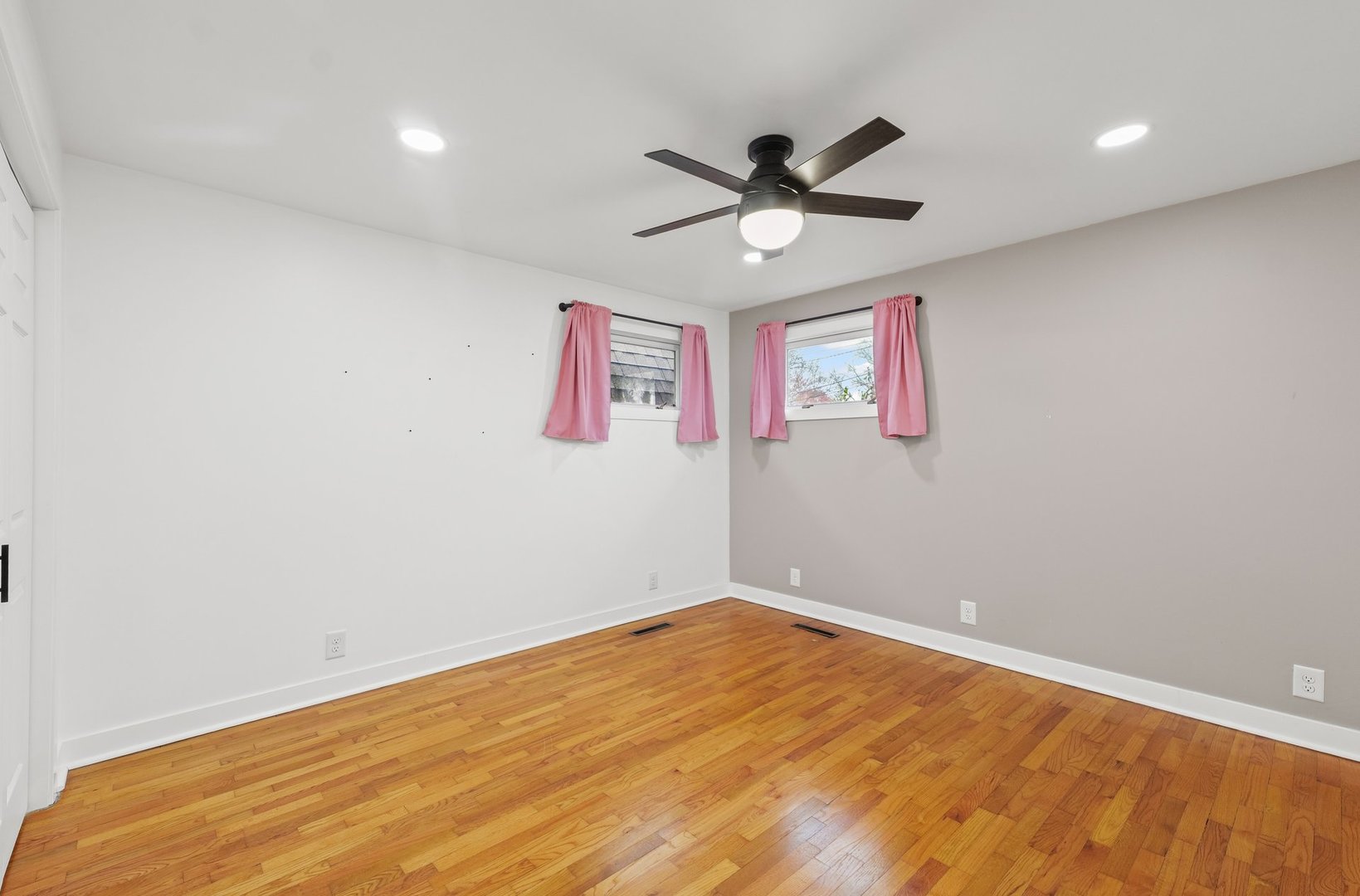 911 South Longview Road Monticello, IL 61856 - Photo 20 of 28 a view of a big room with wooden floor and windows