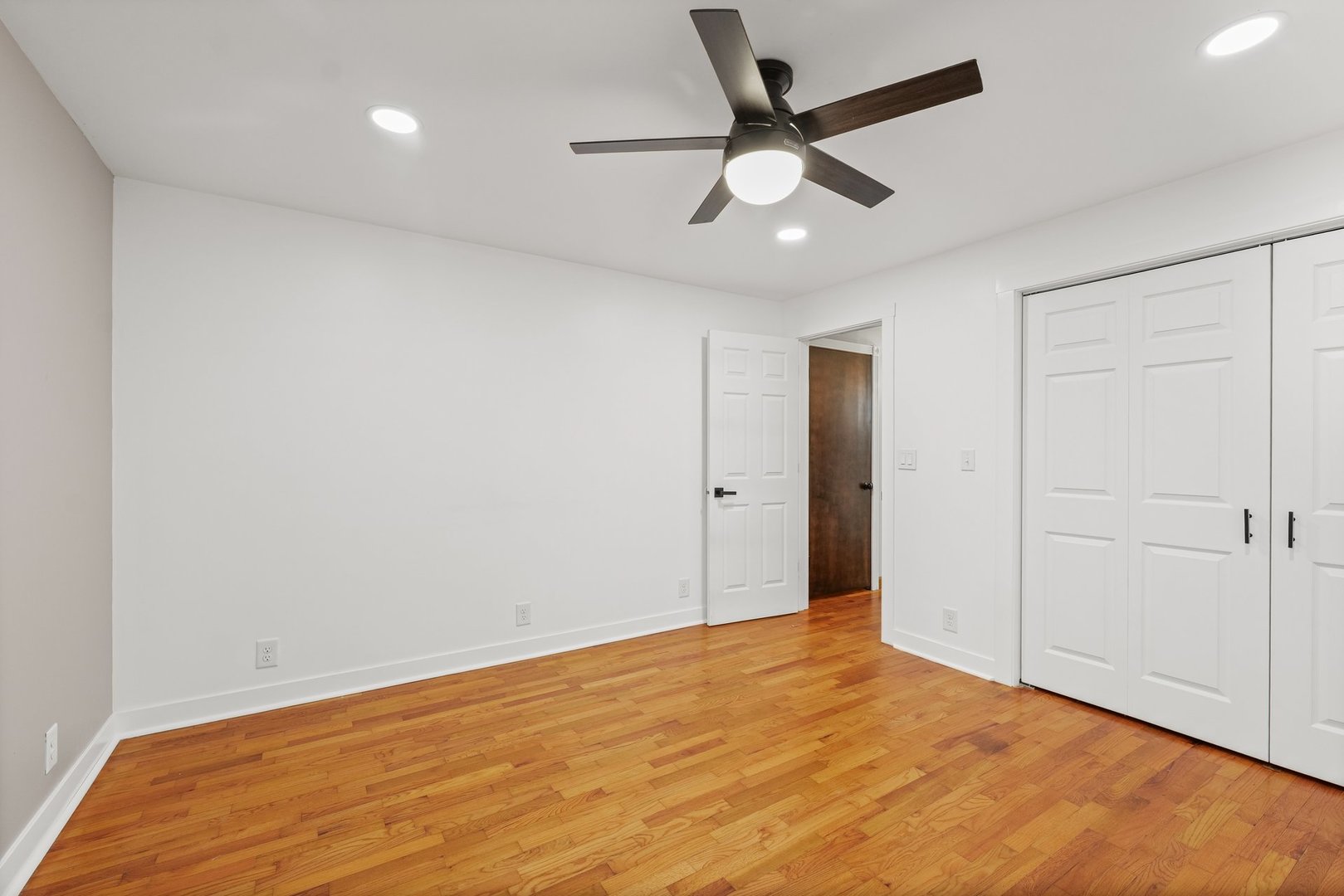 911 South Longview Road Monticello, IL 61856 - Photo 21 of 28 wooden floor in an empty room
