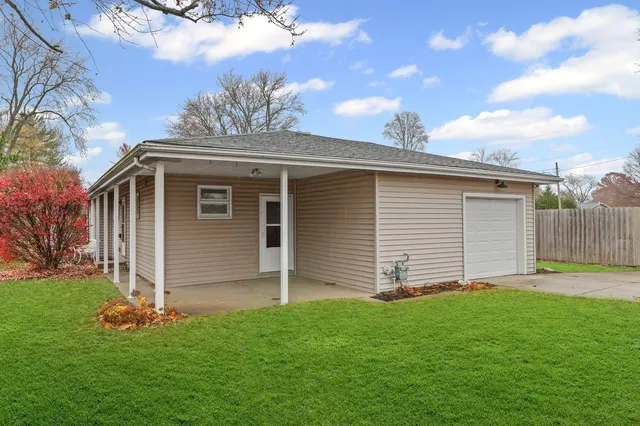 a backyard of a house with lots of green space