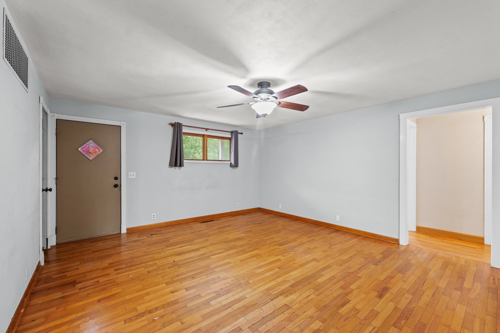 911 South Longview Road Monticello, IL 61856 - Photo 6 of 28 a view of an empty room with a window
