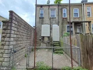 a view of a street with cars