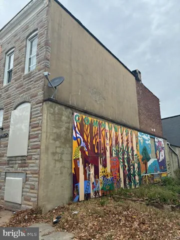 a view of street with parked cars
