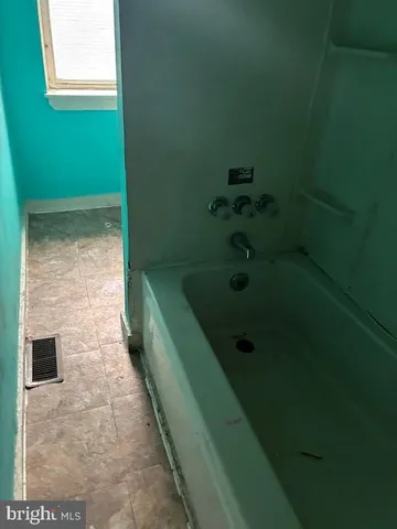 a bathroom with a bathtub