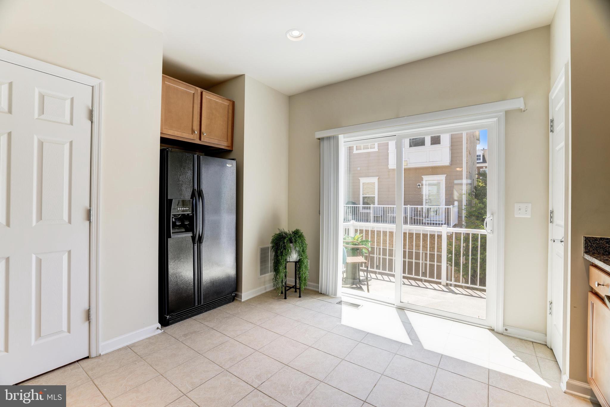 9481 Canonbury Square Fairfax, VA 22031 - Photo 3 of 27 Room for a table & chairs, or an island