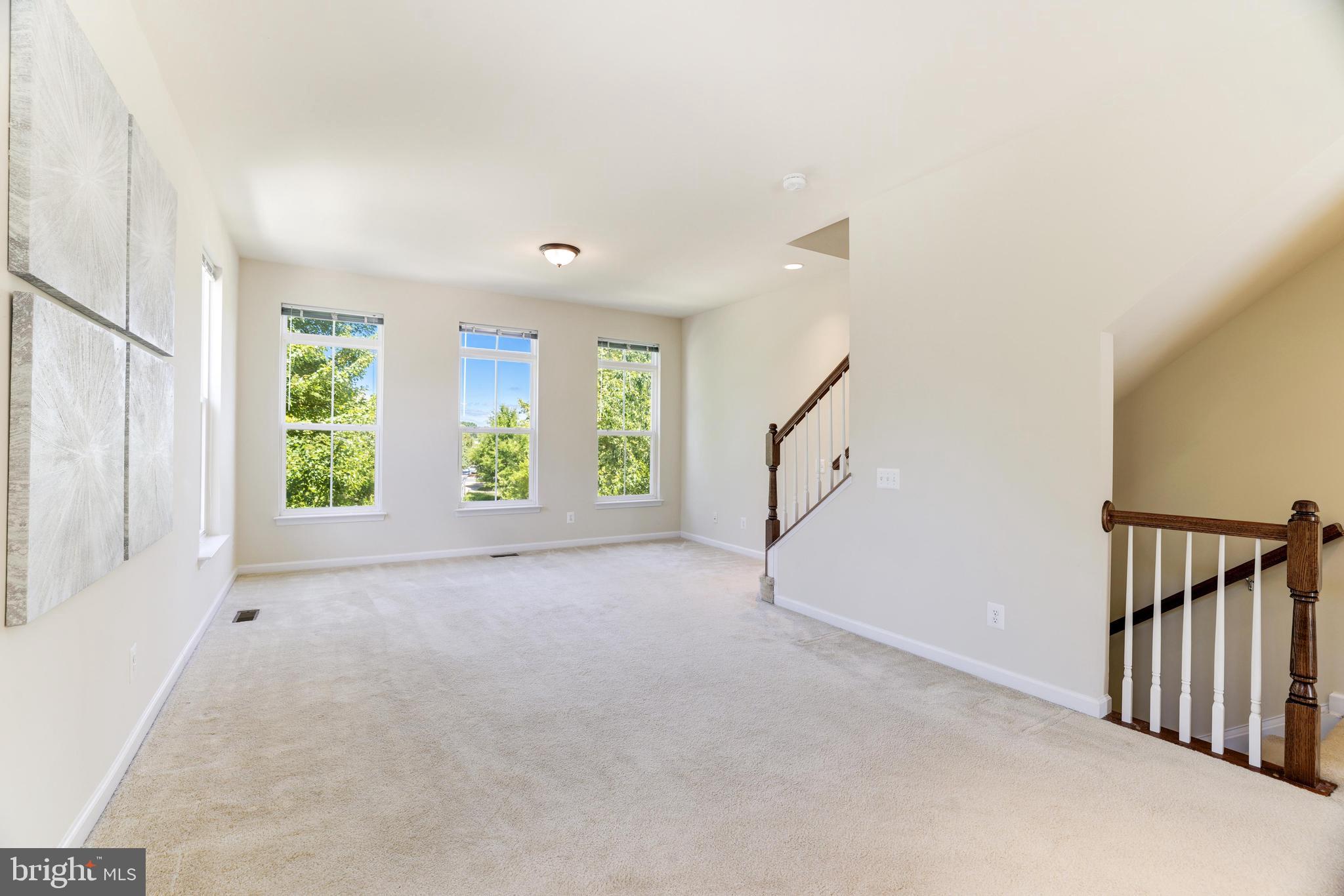 9481 Canonbury Square Fairfax, VA 22031 - Photo 10 of 27 Living Room faces the lovely courtyard