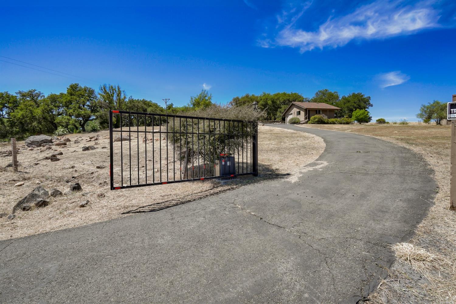6676 Lower Ridge Road Santa Rosa, CA 95404 - Photo 1 of 1 a view of a street with a view of building