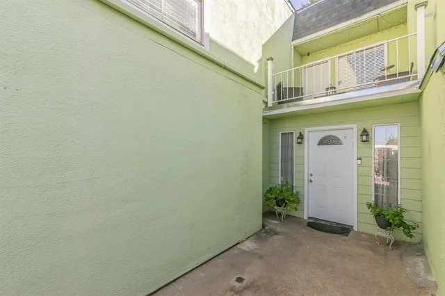 a view of a room with wooden walls
