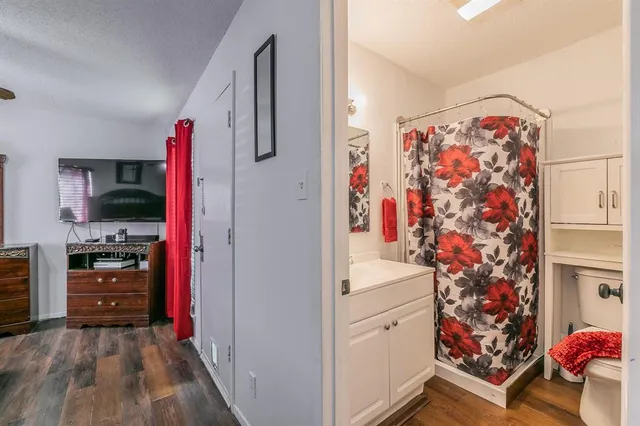 a view of a kitchen with storage and utility room