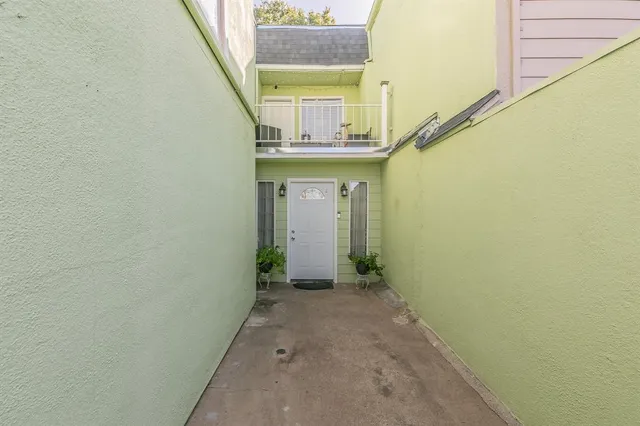 a view of hallway with stairs