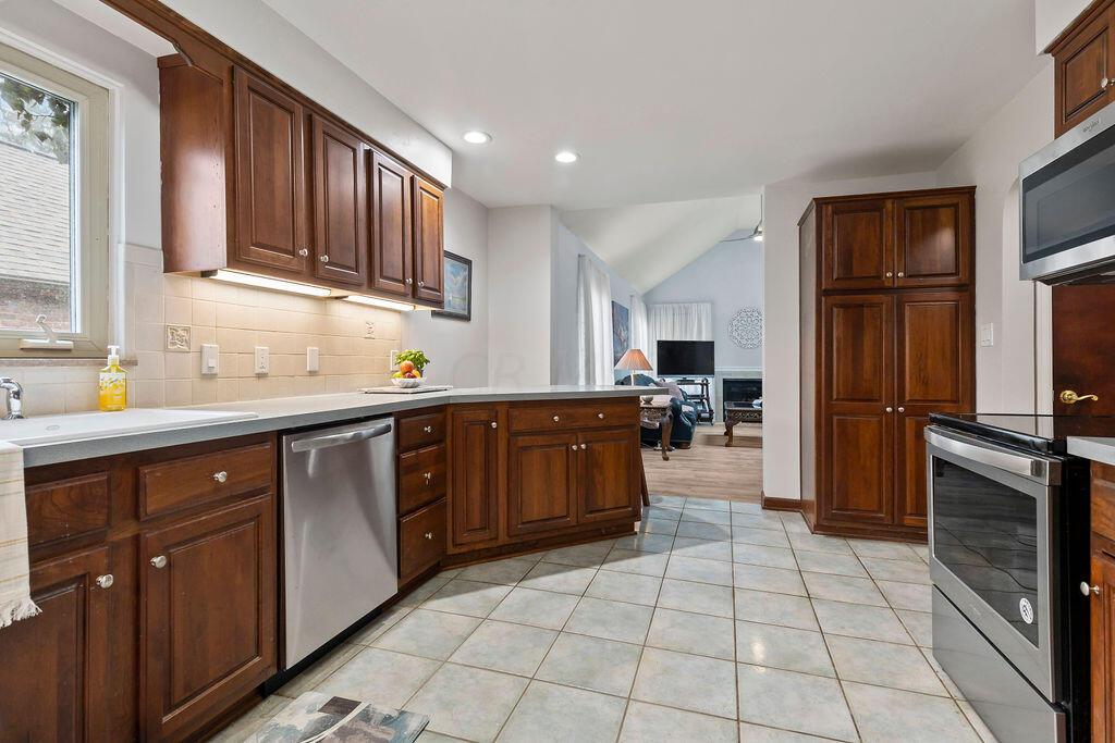 2584 Chester Road Columbus, OH 43221 - Photo 12 of 49 Large kitchen with stainless appliances