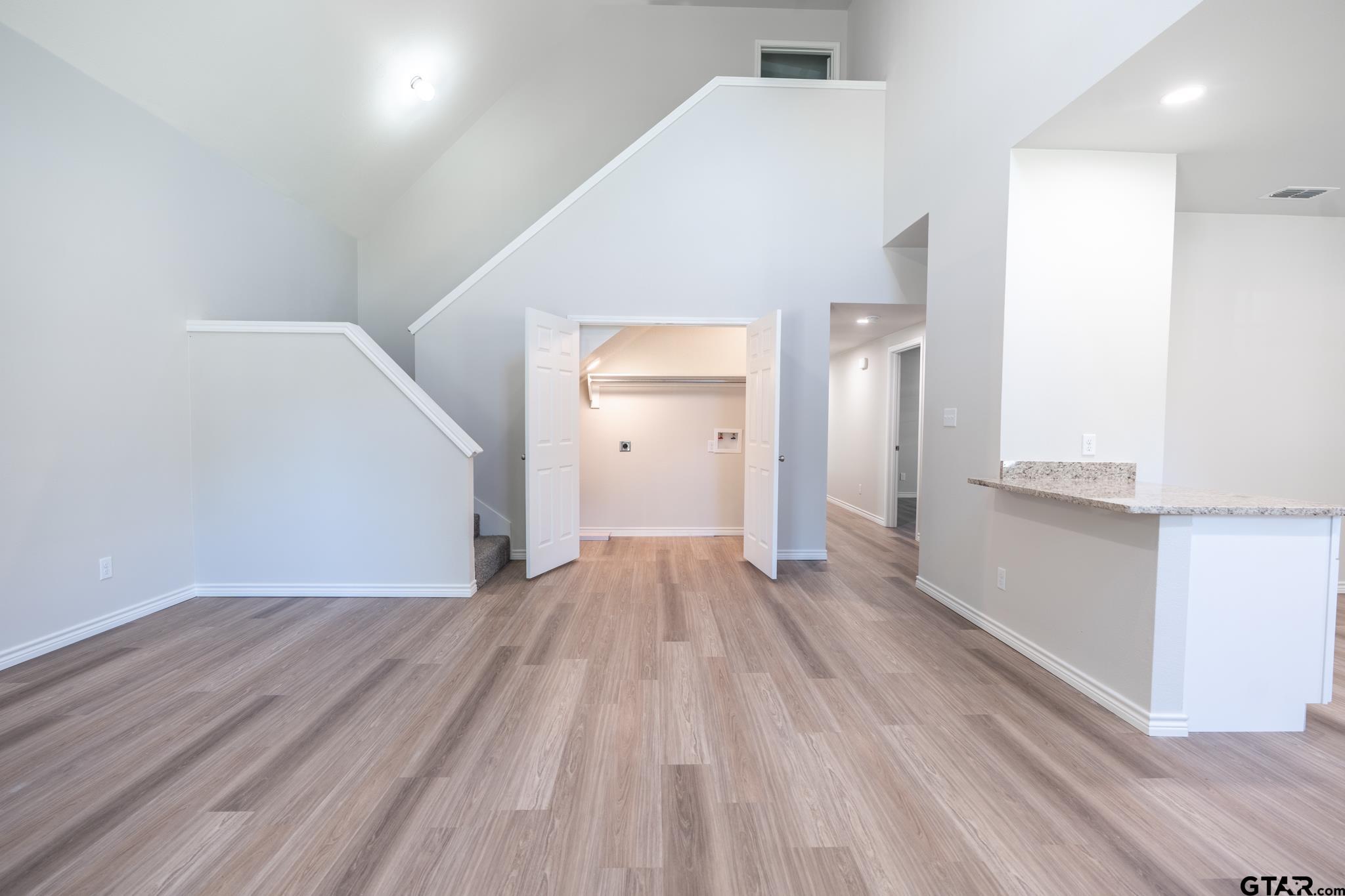 233 Harrison Street Longview, TX 75601 - Photo 24 of 44 a view of hallway with wooden floor