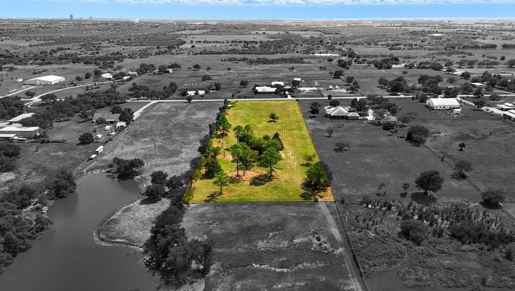 Tbd Chinn Road Denton, TX 76207 - Photo 5 of 19 an aerial view of a house with a swimming pool