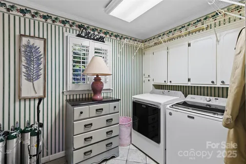 a kitchen that has a cabinets and a stove