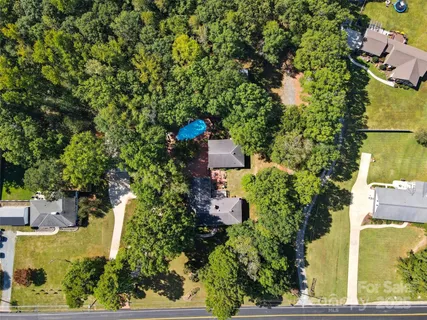 an aerial view of residential house with outdoor space