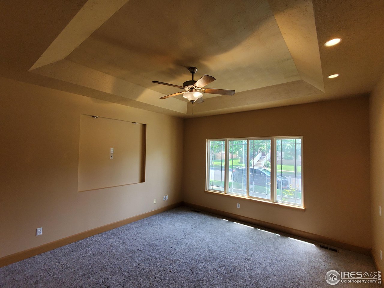 6541 West 18th Street Road Greeley, CO 80634 - Photo 17 of 40 a view of a livingroom with a ceiling fan and window