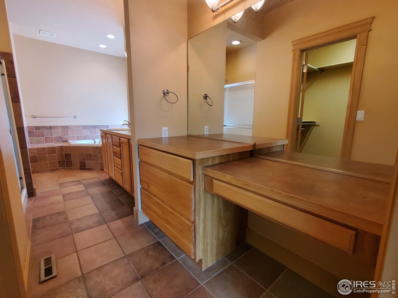 6541 West 18th Street Road Greeley, CO 80634 - Photo 19 of 40 a kitchen with a sink and a refrigerator