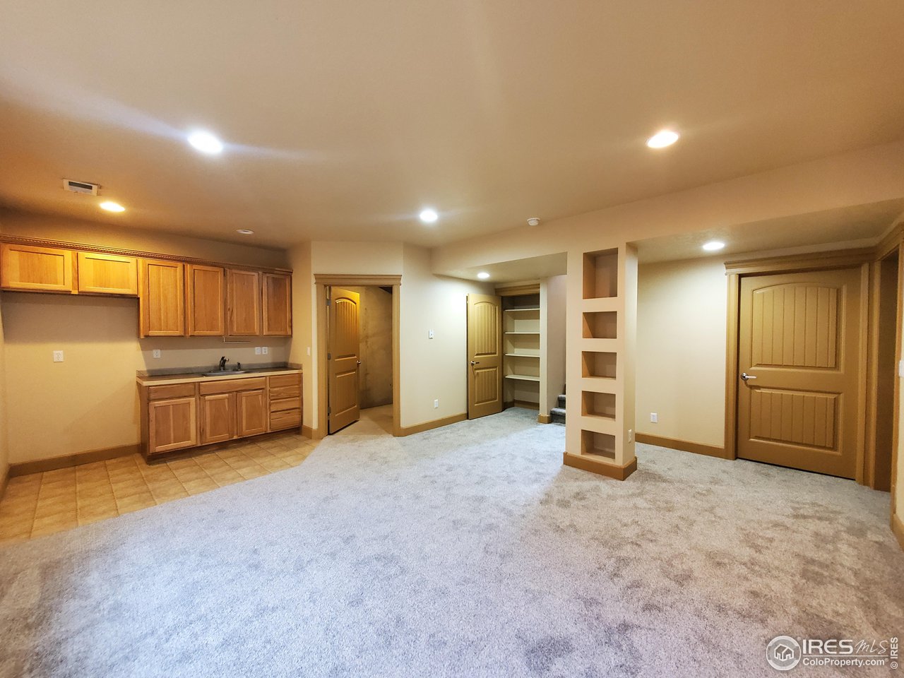 6541 West 18th Street Road Greeley, CO 80634 - Photo 29 of 40 a view of a kitchen with a sink and cabinets