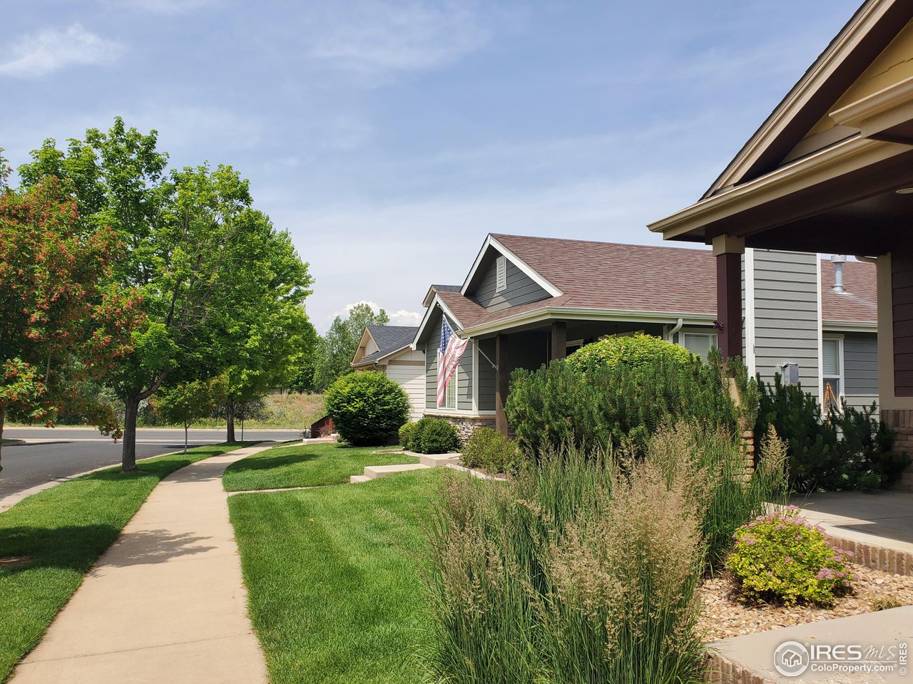 6541 West 18th Street Road Greeley, CO 80634 - Photo 3 of 40 a front view of a house with a yard