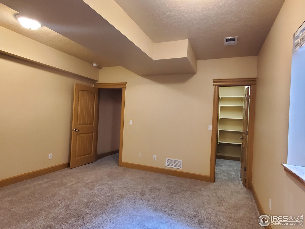 6541 West 18th Street Road Greeley, CO 80634 - Photo 35 of 40 a view of an empty room with a closet