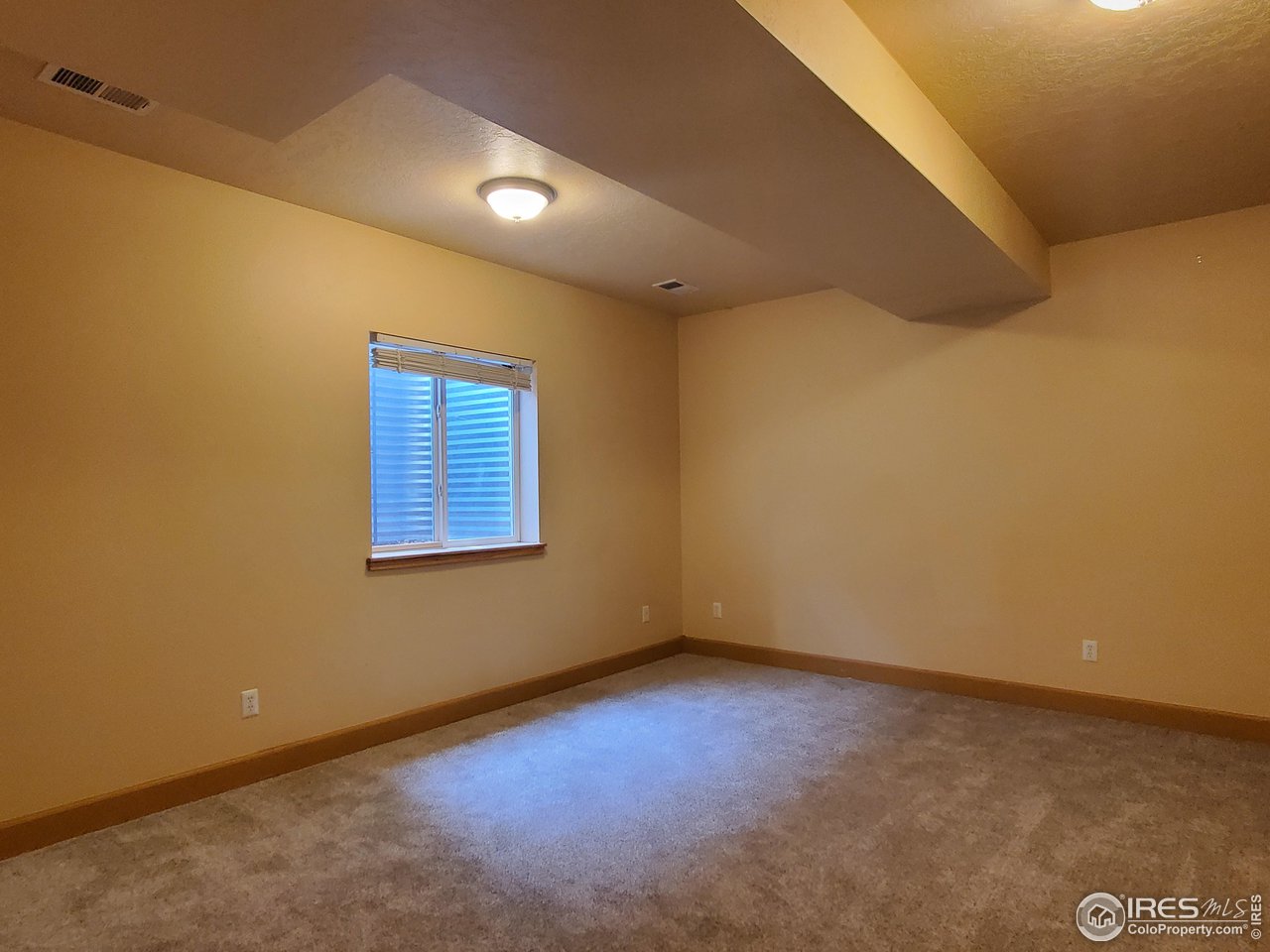6541 West 18th Street Road Greeley, CO 80634 - Photo 37 of 40 a view of an empty room with a window