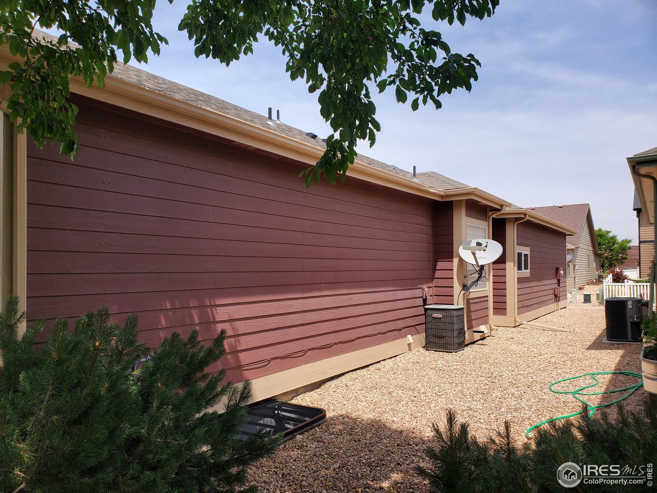 6541 West 18th Street Road Greeley, CO 80634 - Photo 6 of 40 a front view of a house with a yard