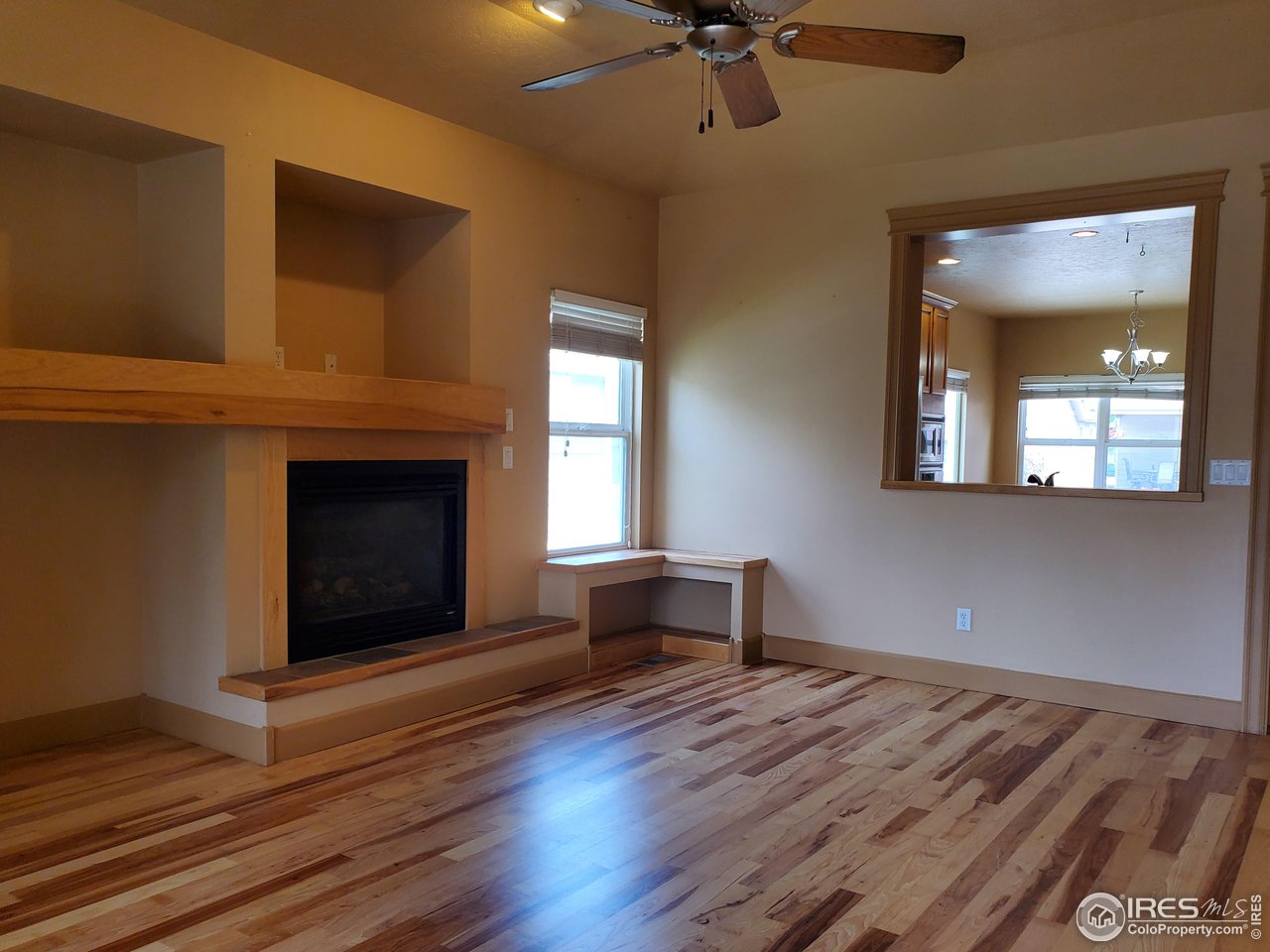 6541 West 18th Street Road Greeley, CO 80634 - Photo 10 of 40 a living room with furniture and a fireplace