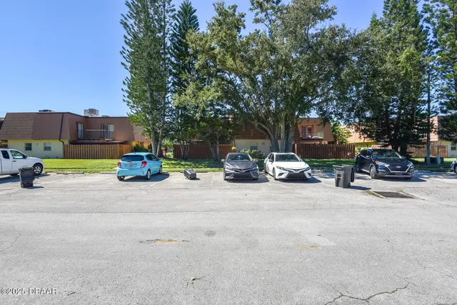 a view of a street with cars