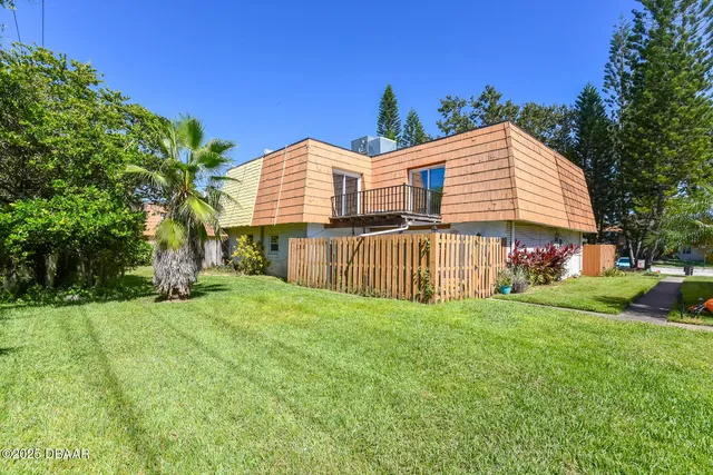 a view of a backyard with a garden