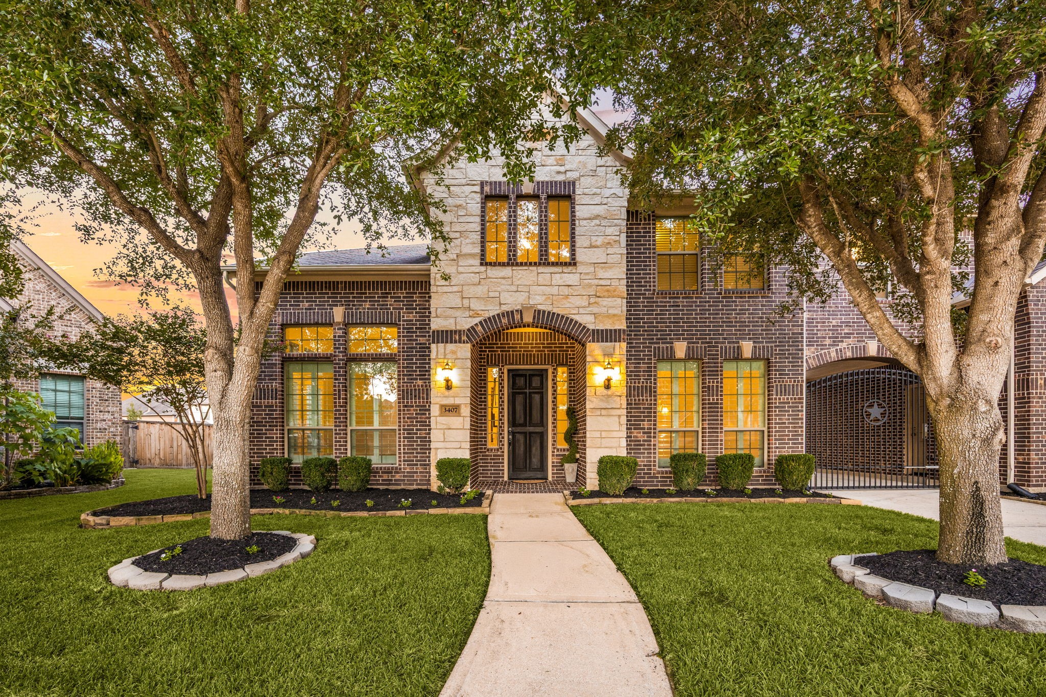 Welcome home to 3407 Cardiff Mist Drive located on a quiet cul-de-sac street in Canyon Lakes at Cardiff Ranch and zoned to Katy ISD! This stunning home has lovely curb appeal, a well-manicured lawn, beautiful landscaping, stone/brick elevation, dark stained front door, covered front porch, traditional style, and beautiful outdoor lanterns!