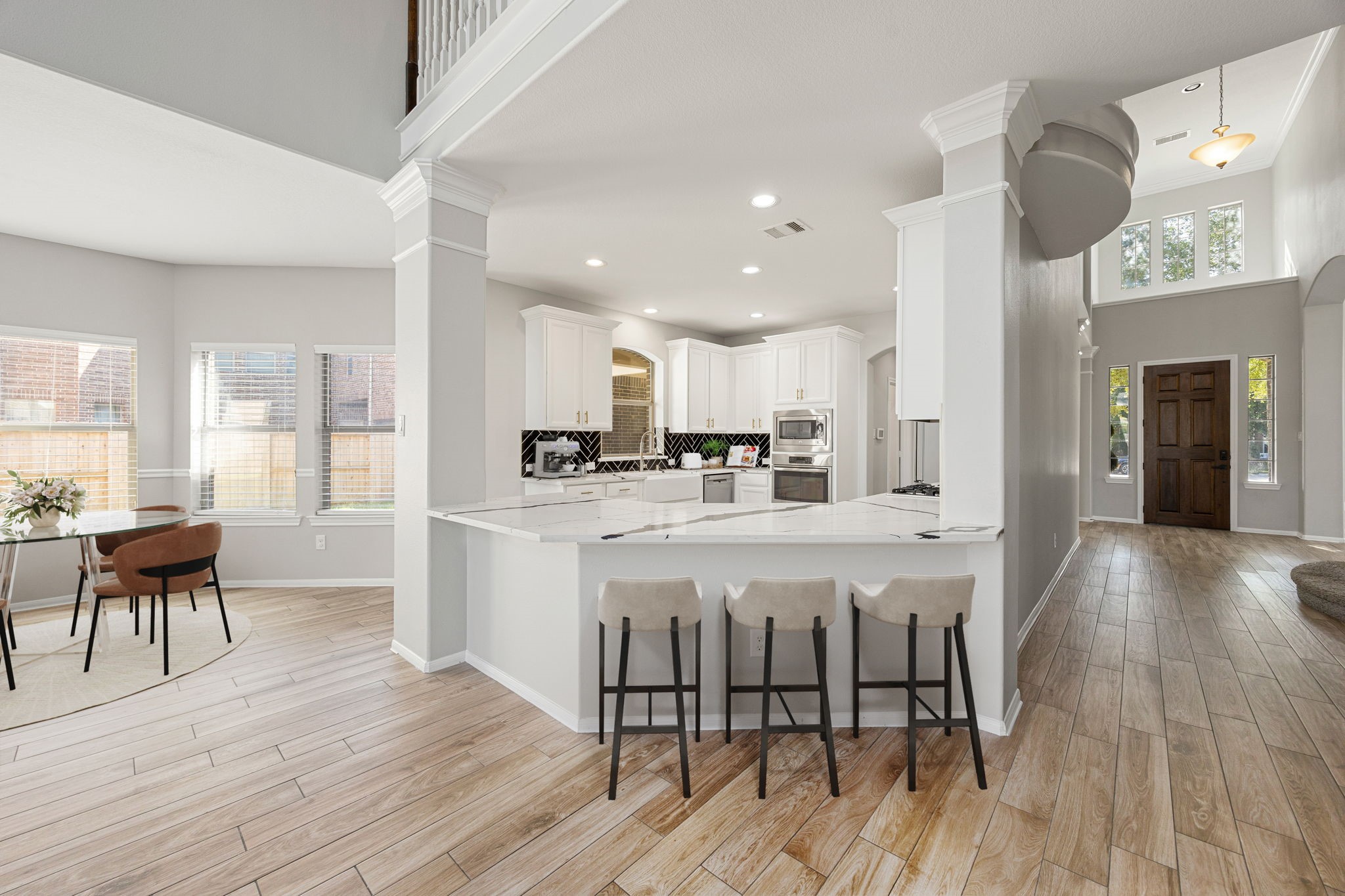 3407 Cardiff Mist Drive Katy, TX 77494 - Photo 8 of 28 Additional view of the open concept living space featuring the spacious kitchen, breakfast bar and breakfast nook! *Virtually staged