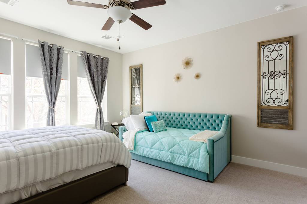 807 East 16th Street, Unit A Austin, TX 78702 - Photo 17 of 29 a bedroom with a bed and window