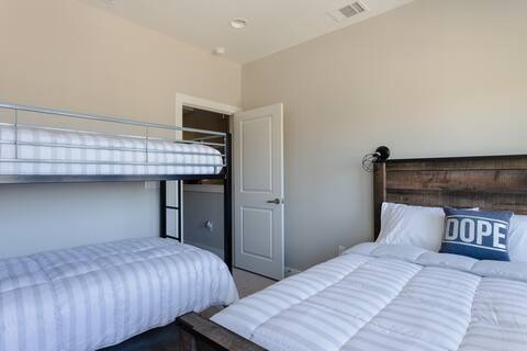 807 East 16th Street, Unit A Austin, TX 78702 - Photo 23 of 29 a bedroom with bed and wooden floor