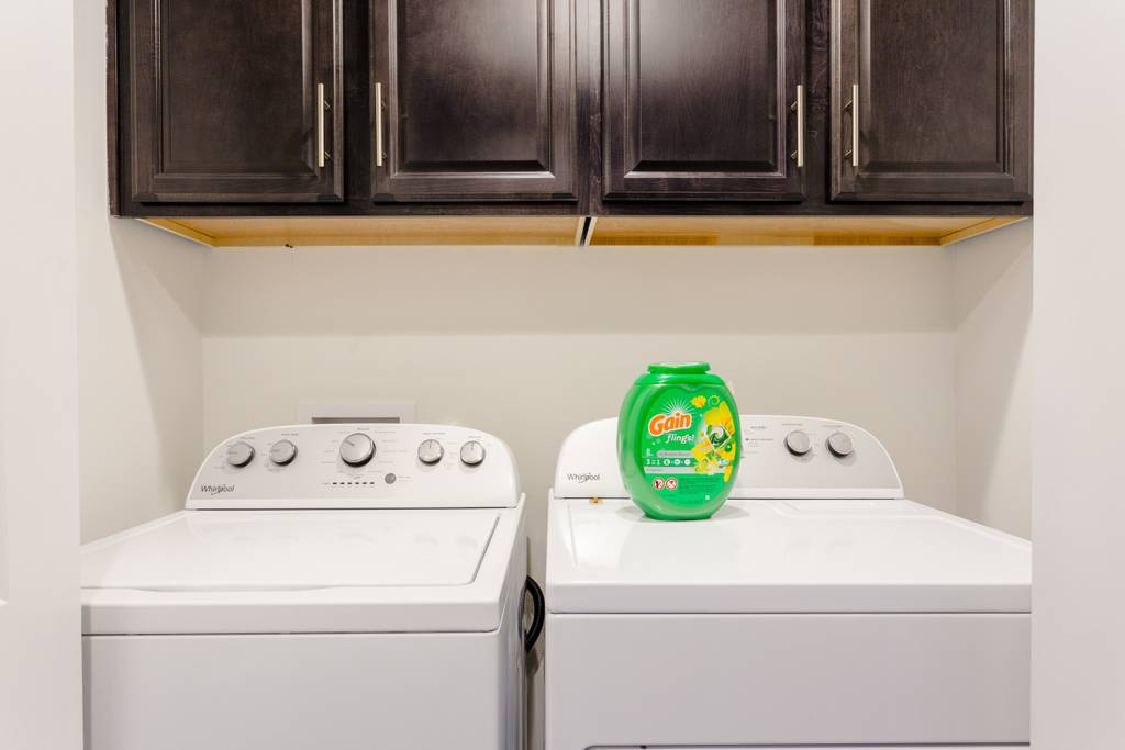 807 East 16th Street, Unit A Austin, TX 78702 - Photo 27 of 29 a utility room with dryer and washer
